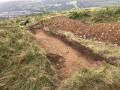 Archaeological investigation on Twmbarlwm, Risca, south Wales. performed by Clwyd Powys Archaeological Trust; organised by Cymdeithas Twmbarlwm Society, Funded by Cadw