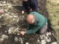 Archaeological investigation on Twmbarlwm, Risca, south Wales. performed by Clwyd Powys Archaeological Trust; organised by Cymdeithas Twmbarlwm Society, Funded by Cadw