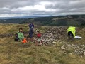 Archaeological investigation on Twmbarlwm, Risca, south Wales. performed by Clwyd Powys Archaeological Trust; organised by Cymdeithas Twmbarlwm Society, Funded by Cadw