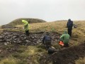 Archaeological investigation on Twmbarlwm, Risca, south Wales. performed by Clwyd Powys Archaeological Trust; organised by Cymdeithas Twmbarlwm Society, Funded by Cadw