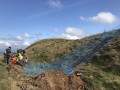 Archaeological investigation on Twmbarlwm, Risca, south Wales. performed by Clwyd Powys Archaeological Trust; organised by Cymdeithas Twmbarlwm Society, Funded by Cadw